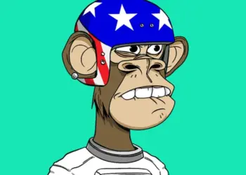 A digital illustration of a cartoon ape wearing a blue helmet with white stars and a white shirt. The ape has a serious expression, perhaps pondering how to make money with NFT art, against a solid turquoise background. | eCryptoBit
